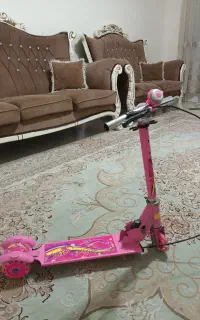 اسکوتر صورتی