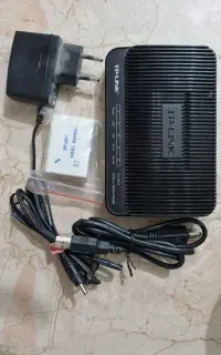 مودم adsl  با تمام  وسایل tp-link مدل 8817