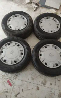لاستیک پژو 205//60/14 صفر با رینگ