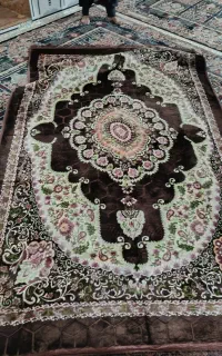 روی فرشی پتویی