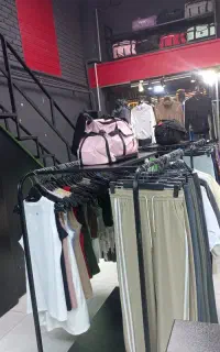 به همکار خانوم در فروشگاه لباس ورزشی نیازمندیم