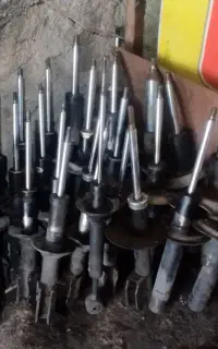تعمیر کمک فنر هیدرولیک اکسل با ضمانت