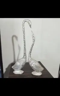 قو برنزی رنگ نقره ای خورده