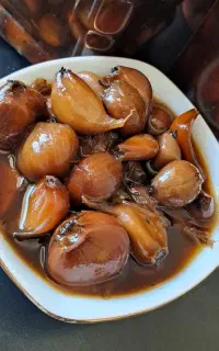 ترشی سیر10ساله کاملاخانگی و اصیل(بسیار جا افتاده)