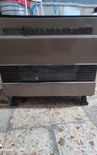 بخاری گازی وچهار پایه فلزی
