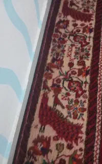 قالی دستباف طاووسی