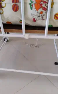 تخت نوزاد کنار مادر