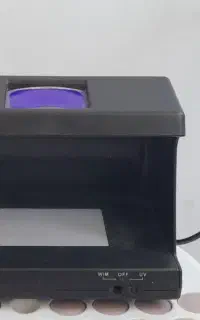 دستگاه تشخیص اسکناس تقلبی