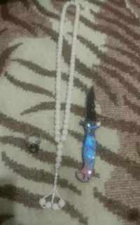 انگشتر تسبیح داس  وچاقو