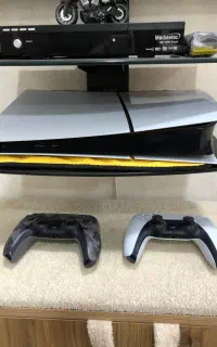 PS5 اسلیم + دو دسته + فن خنک کننده + ۴ تا بازی