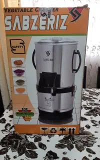 یک دستگاه سبزی خورد کن برقی ۲ کیلویی