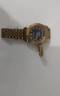 ساعت و حلقه رولکس