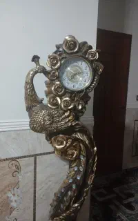 ساعت طرح طاووس