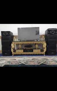میز تلویزیون  ساعت چوبی و طرح برنجی جاکفشی و...