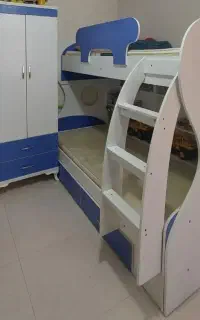 تخت دوطبقه با کمد