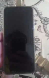 کوشی نونو همراه با کارتون Redmi 14C