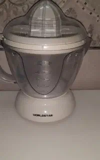 آب برتقال گیری برقی