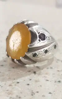 انگشتر نقره دستساز یاقوت زرد مخراجکاری