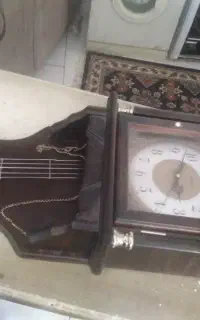 ساعت دیواری سالم وبخاری گازی