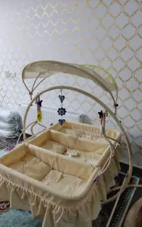 گهواره سه قلو
