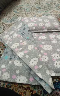 تشک و بالش نوزاد