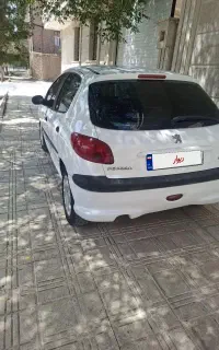سواری پژو 206تیپ 2مدل1390سفید(فروش یا معاوضه)