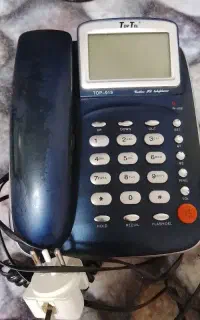 تلفن ثابت  و فرش کودک و کلید و پریز