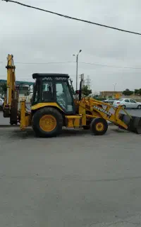 بیل بکهو لودر وکامیون