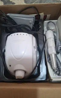 دستگاه کاشت ناخن