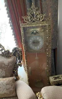 ساعت برنزی ایستاده سنگین