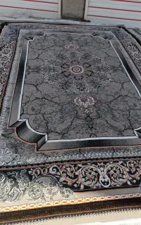 فرش کوروش متن پایین را بخوانید