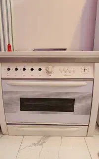 اجاق گاز و میز تلویزیون و کالسکه فروشی