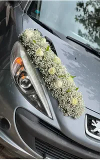 دستگل و گل آرایی ماشین عروس