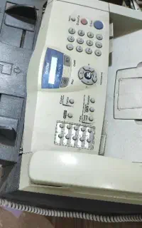 گوشی تلفن و فکس سه کاره کپی هم داره