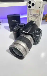 دوربین نیکون3100d ولنز ۲۸-۸۰باگلس ولوازم