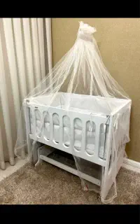 گهواره کنار مادر