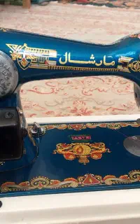 چرخ خیاطی مارشال.پدالی و دستی.دوشیر نشان.رنگ آبی