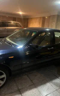 بی ام و ۳۱۸iسرمه ای