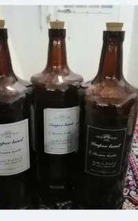 بطری شیشه‌ای و گالن مخصوص سرکه