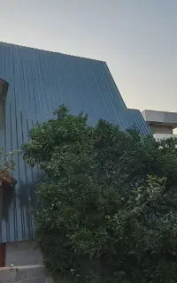 حلب‌کاری و اجرای سقف و نمای ساختمان