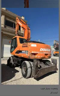 بیل مکانیکی لاستیکی دوسان