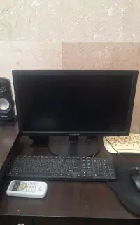 یک ست کامپیوتر با کیس و کیبورد و مانیتور و باند