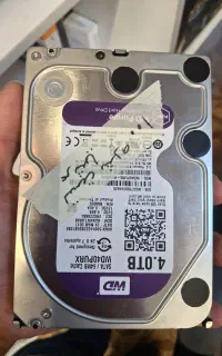 دو عدد هارد hdd بنفش ۴ ترا ۱ ترا آبی
