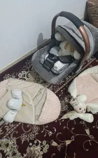 نی نی مالا و آغوشی وکیسه خواب