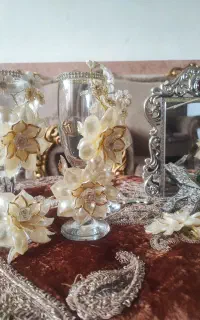 هفت سین گل آرایی شده با لیوان پیک