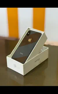 آیفون XS با قوطی و مالکیت