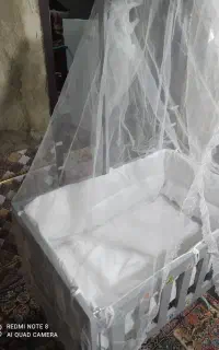 گهواره کنار مادر