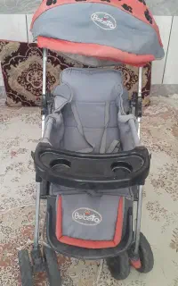 کالسکه همراه با تشک وکفش سایز۲۲بالشت شیردهی نو