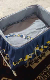 تخت نوزاد و نی نی لای لای