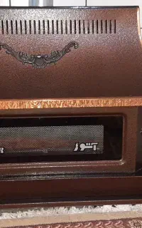 بخاری گازی طرح شومینه